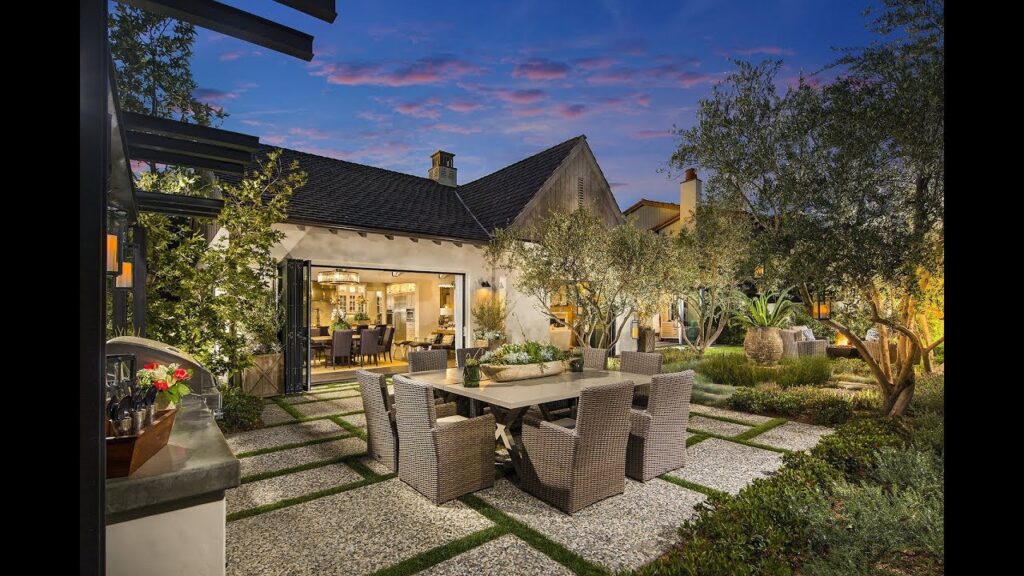 Landscaping with patio furniture.